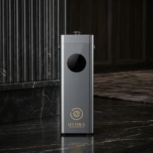 Grey OTURA ELITE Commercial Scent Diffuser in a luxury hotel lobby.